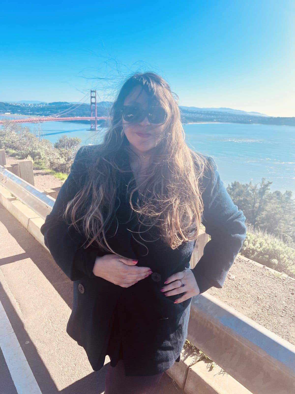 Miranda Trujillo in front of the Golden Gate Bridge